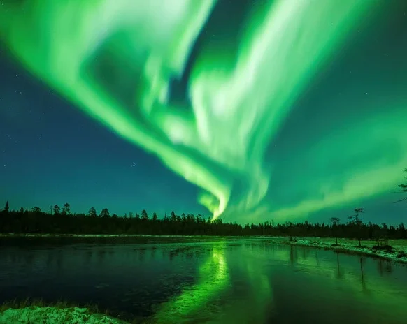 Imagen generada que ilustra una aurora boreal.