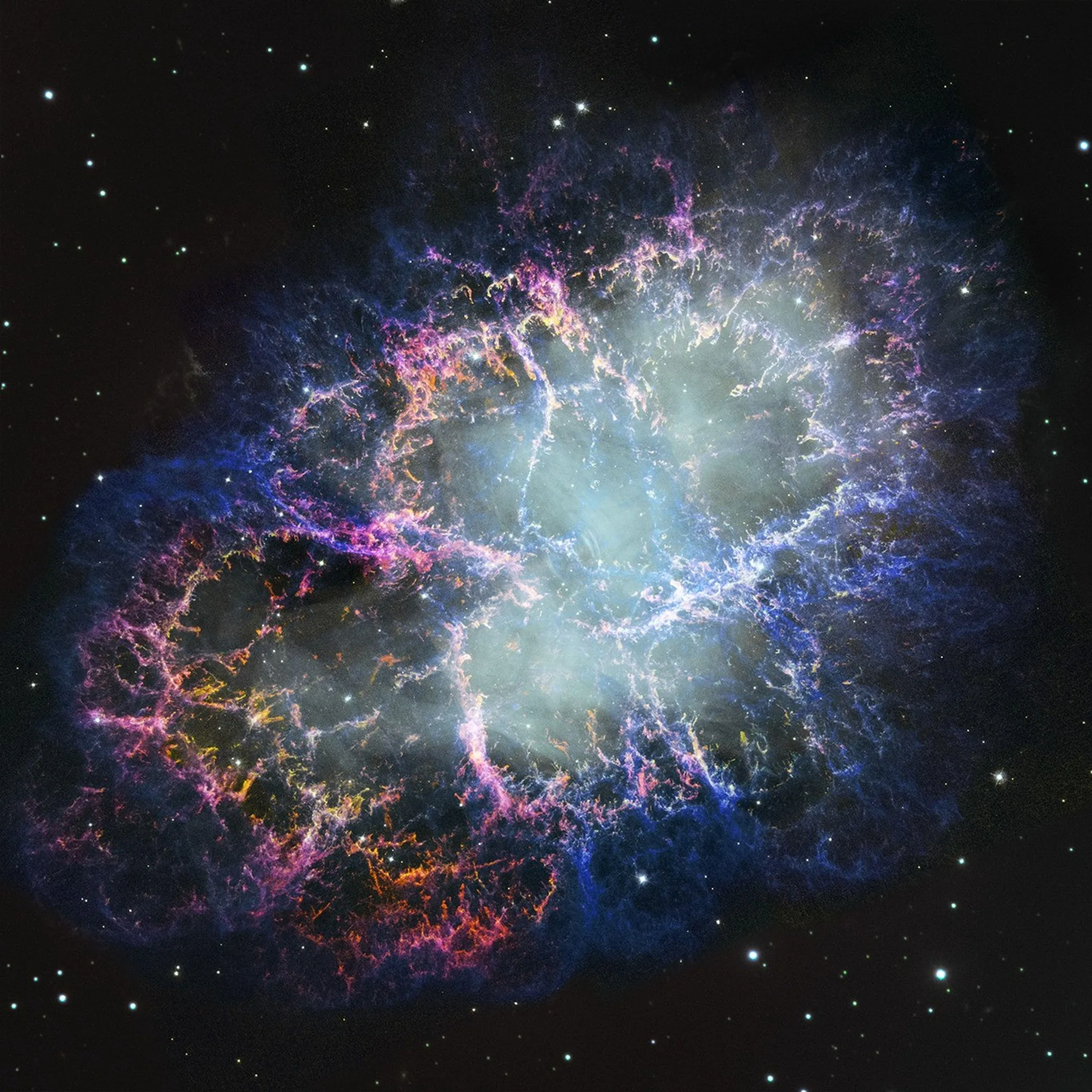 Nebulosa del Cangrejo observada por Hubble, con filamentos rosados y azulados alrededor de una región central luminosa.